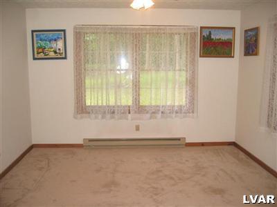 1320 Kroucher Road Stroudsburg, PA 18360 - Photo 5 of 27 an empty room with a window