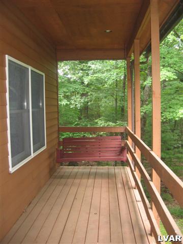 1320 Kroucher Road Stroudsburg, PA 18360 - Photo 7 of 27 a view of balcony with wooden floor and outdoor space