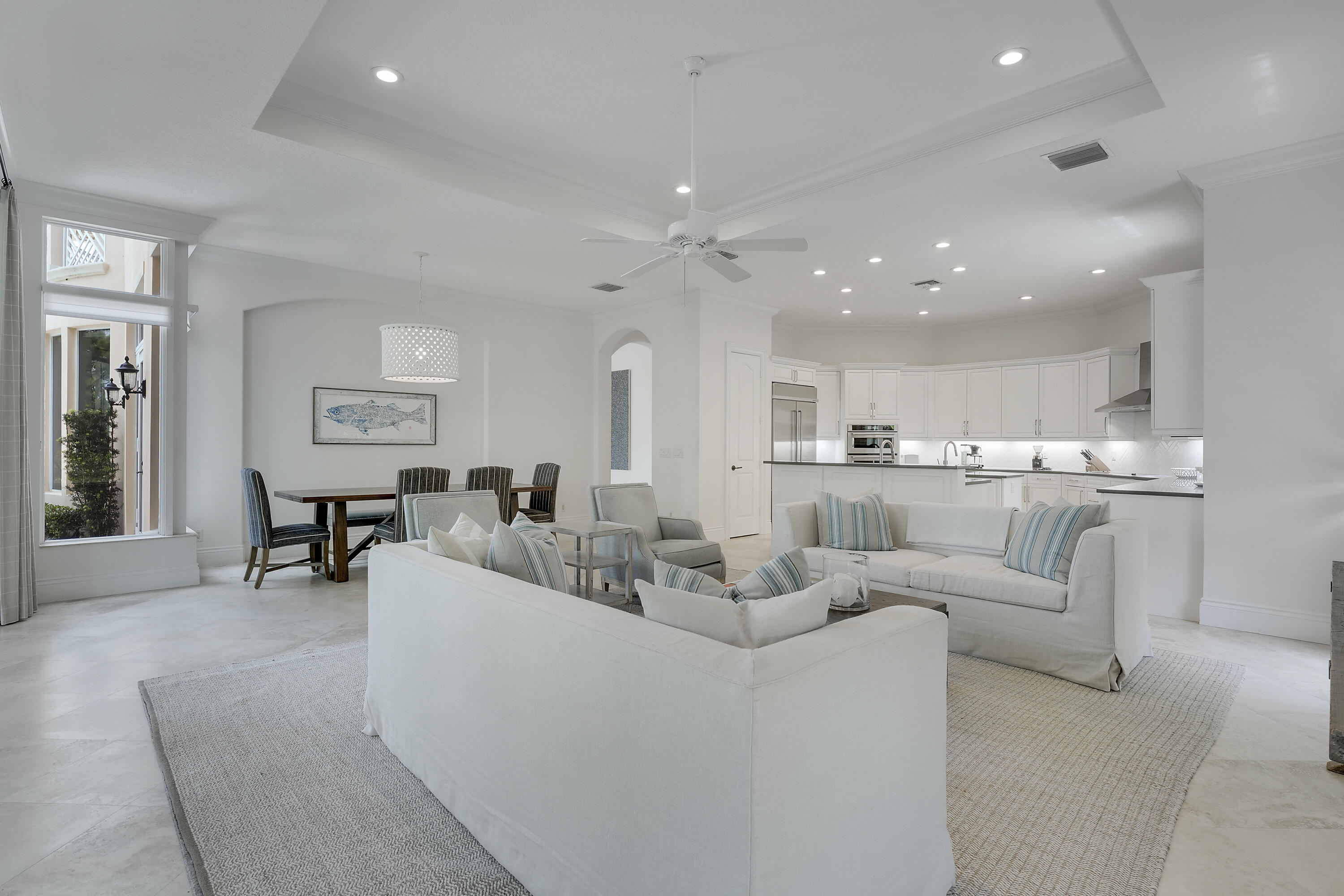 140 Tulip Tree Court Jupiter, FL 33458 - Photo 12 of 80 a living room with furniture and a view of kitchen