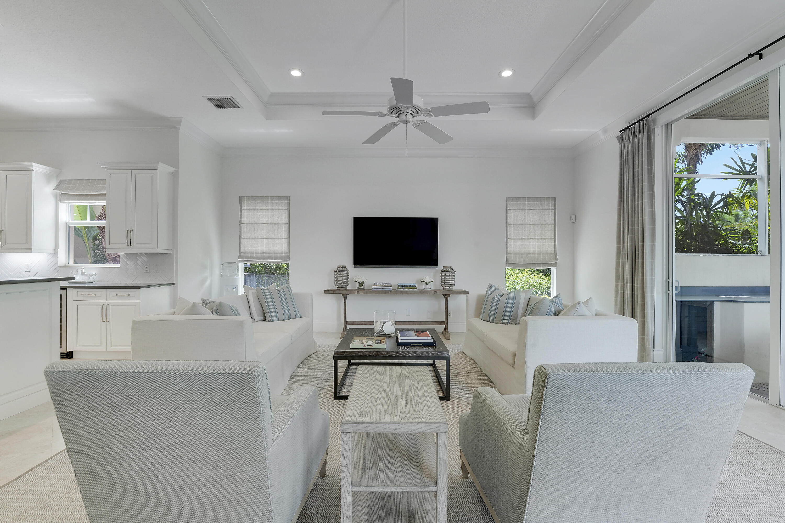 140 Tulip Tree Court Jupiter, FL 33458 - Photo 17 of 80 a living room with furniture and a flat screen tv