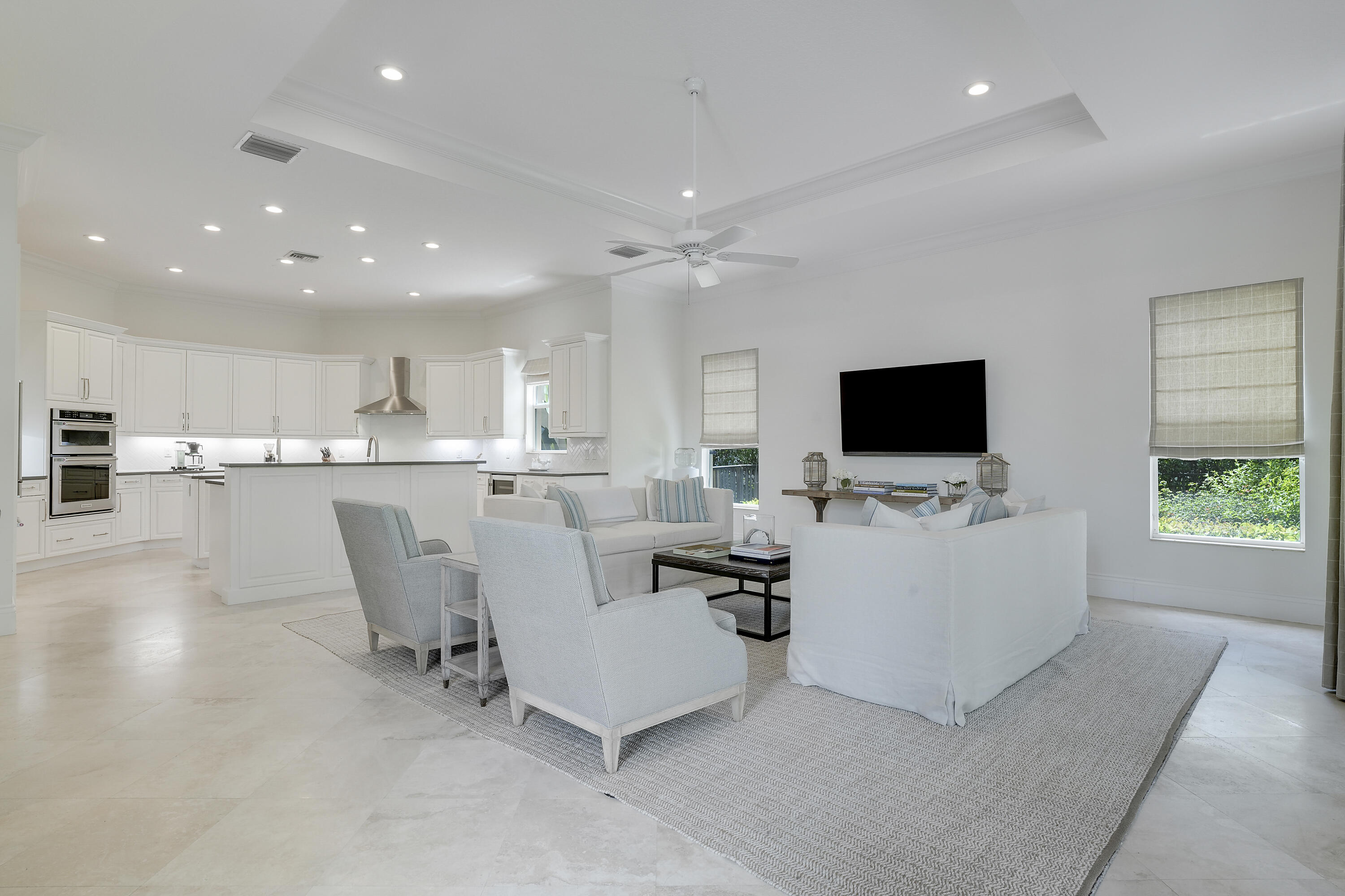 140 Tulip Tree Court Jupiter, FL 33458 - Photo 20 of 80 a living room with furniture and a flat screen tv