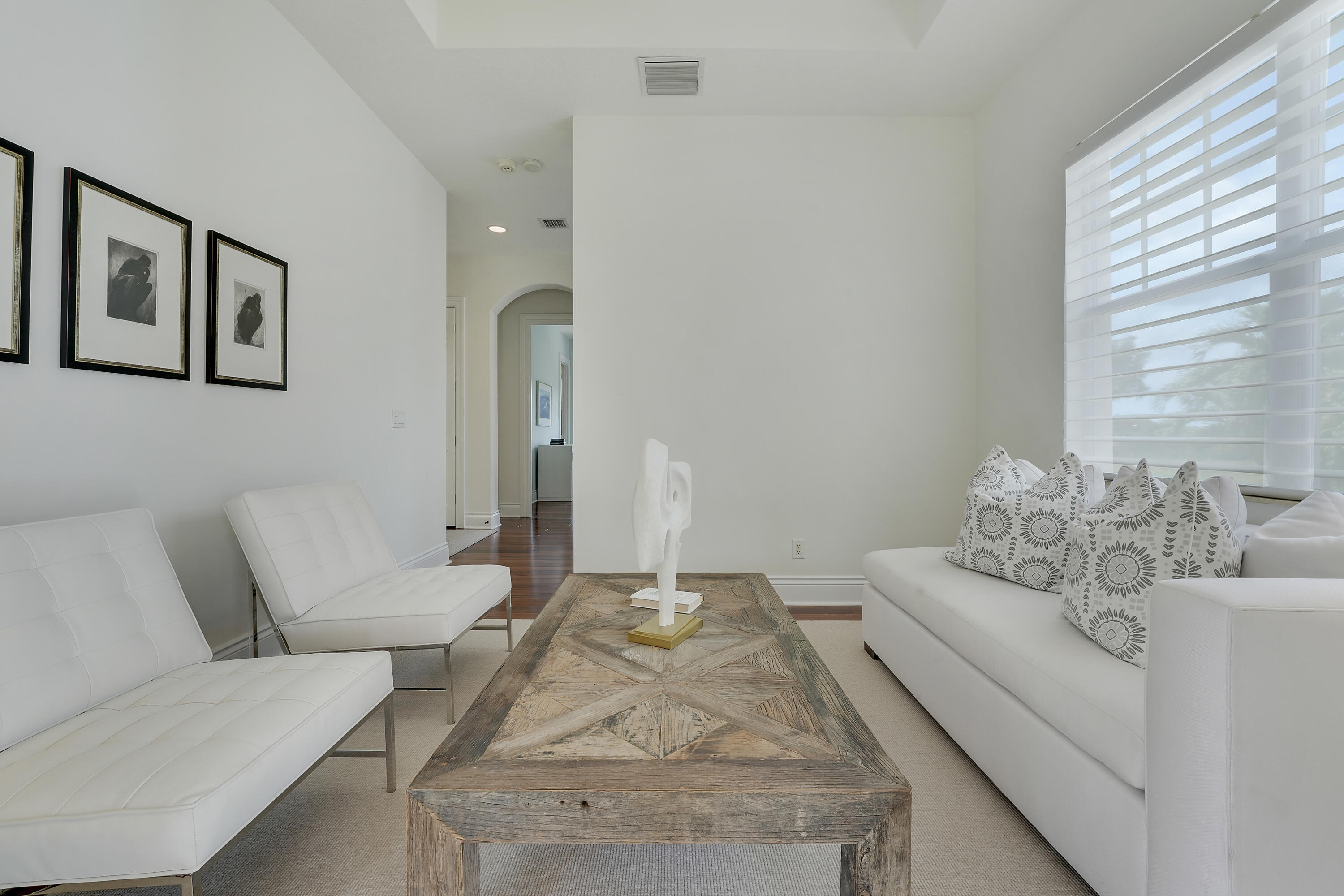 140 Tulip Tree Court Jupiter, FL 33458 - Photo 39 of 80 a living room with furniture and a large mirror
