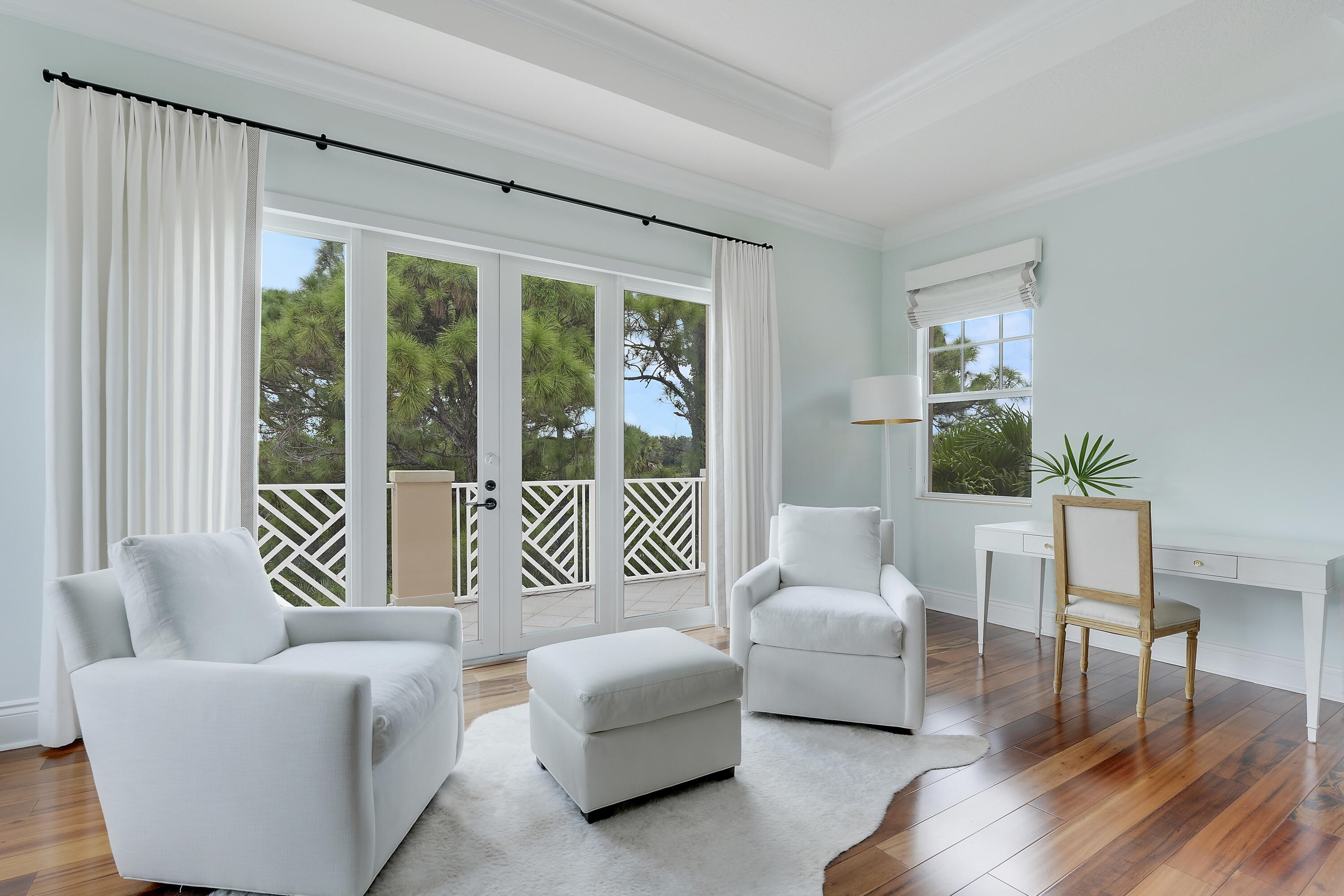 140 Tulip Tree Court Jupiter, FL 33458 - Photo 47 of 80 a living room with furniture and a large window