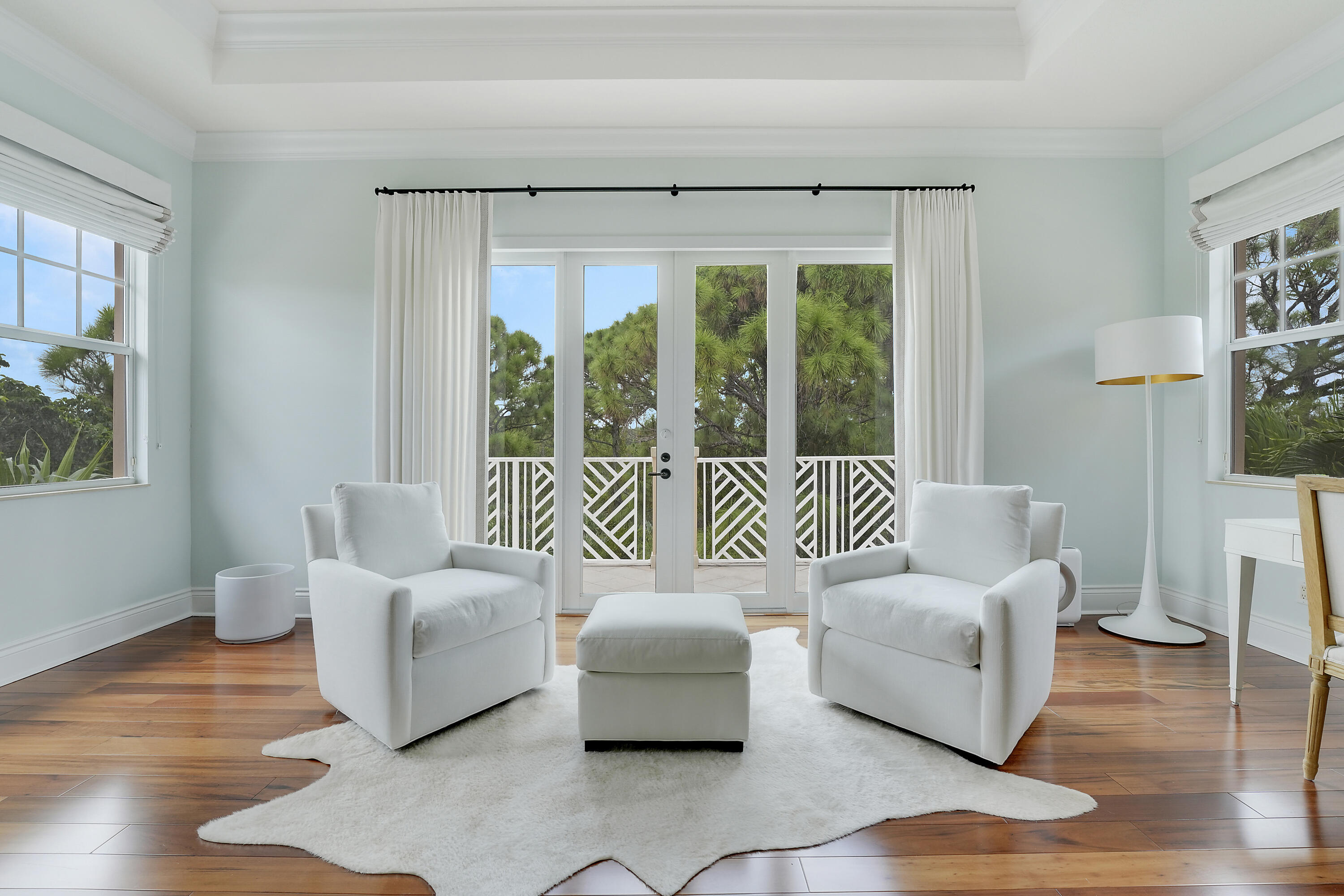 140 Tulip Tree Court Jupiter, FL 33458 - Photo 48 of 80 a bedroom with furniture and a large window