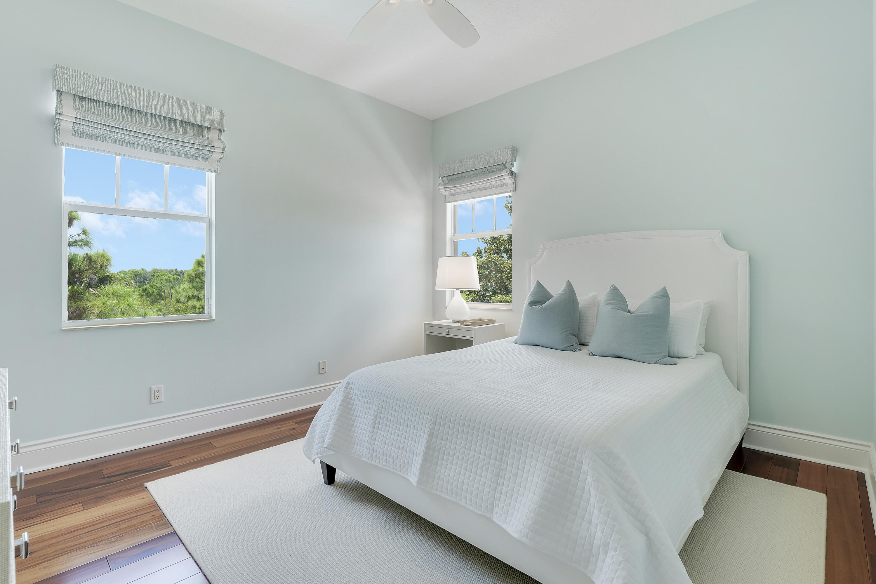 140 Tulip Tree Court Jupiter, FL 33458 - Photo 57 of 80 a bedroom with a bed and window