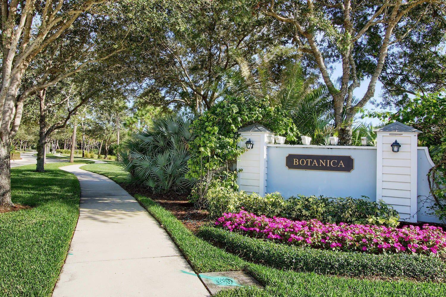 140 Tulip Tree Court Jupiter, FL 33458 - Photo 65 of 80 a sign on the side of the road