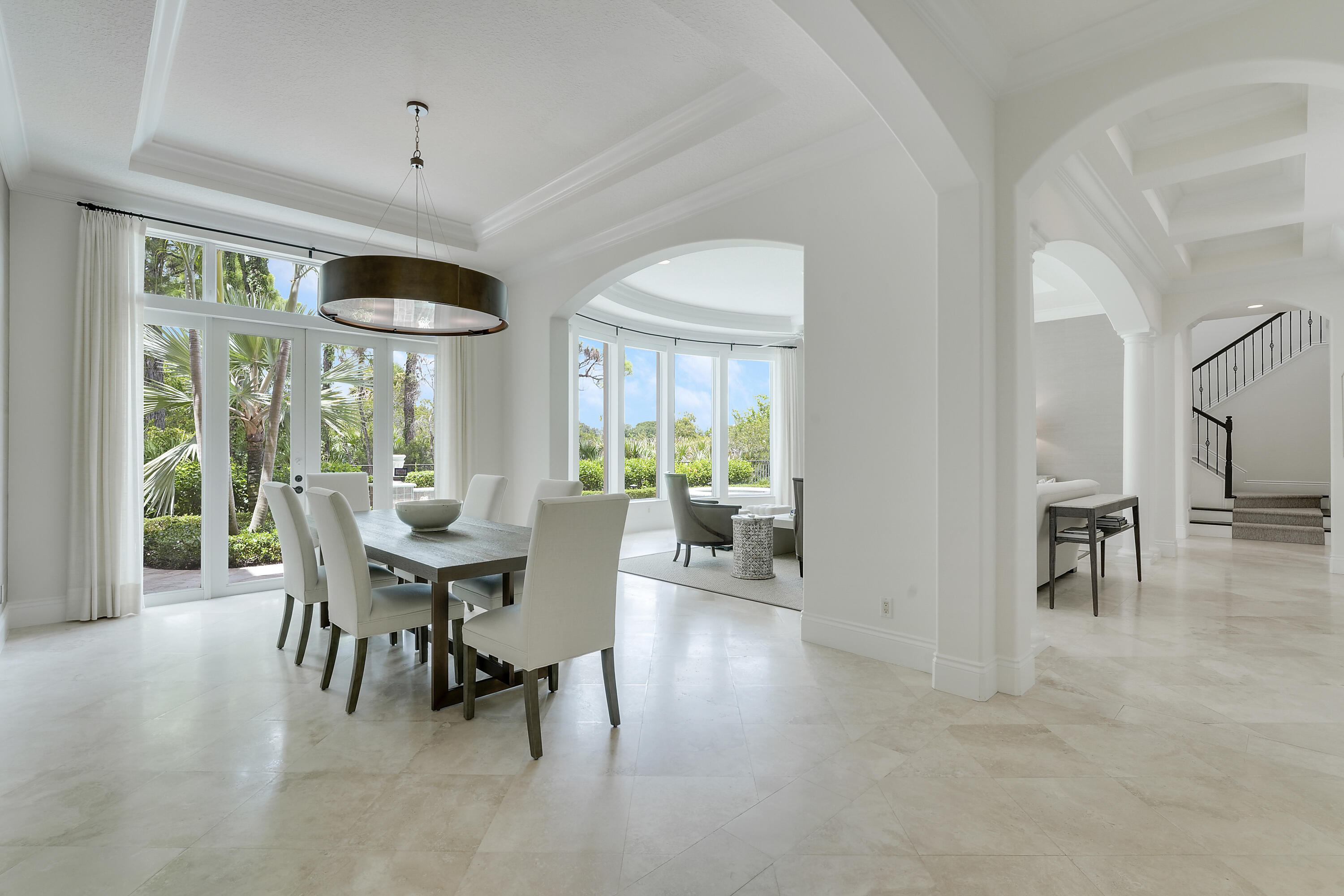 140 Tulip Tree Court Jupiter, FL 33458 - Photo 7 of 80 a view of a dining room with furniture window and outside view