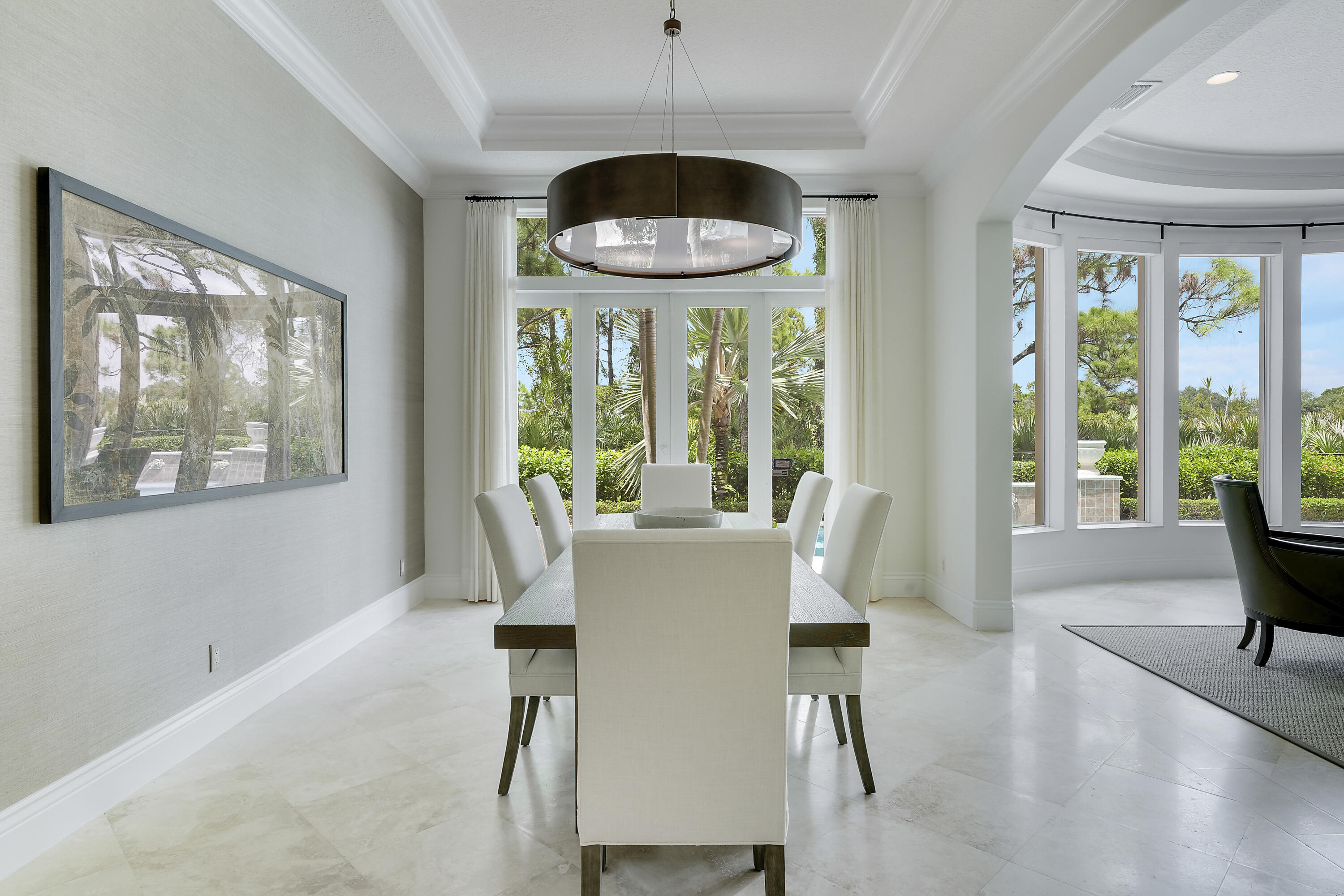 140 Tulip Tree Court Jupiter, FL 33458 - Photo 8 of 80 a view of a dining room with furniture window and outside view