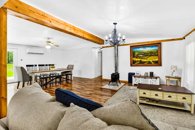 a bedroom with a bed and a table in it