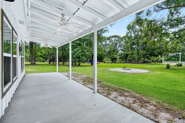 a kitchen with stainless steel appliances granite countertop a stove sink and cabinets