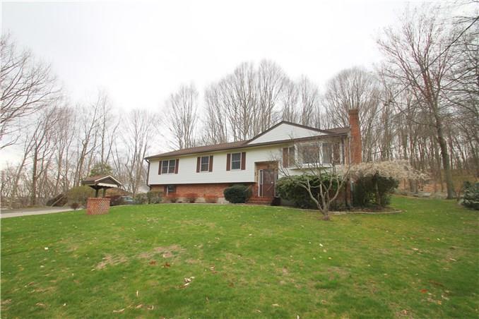192 Bungay Road Seymour, CT 06483 - Photo 1 of 1 a view of a house with a yard and sitting area