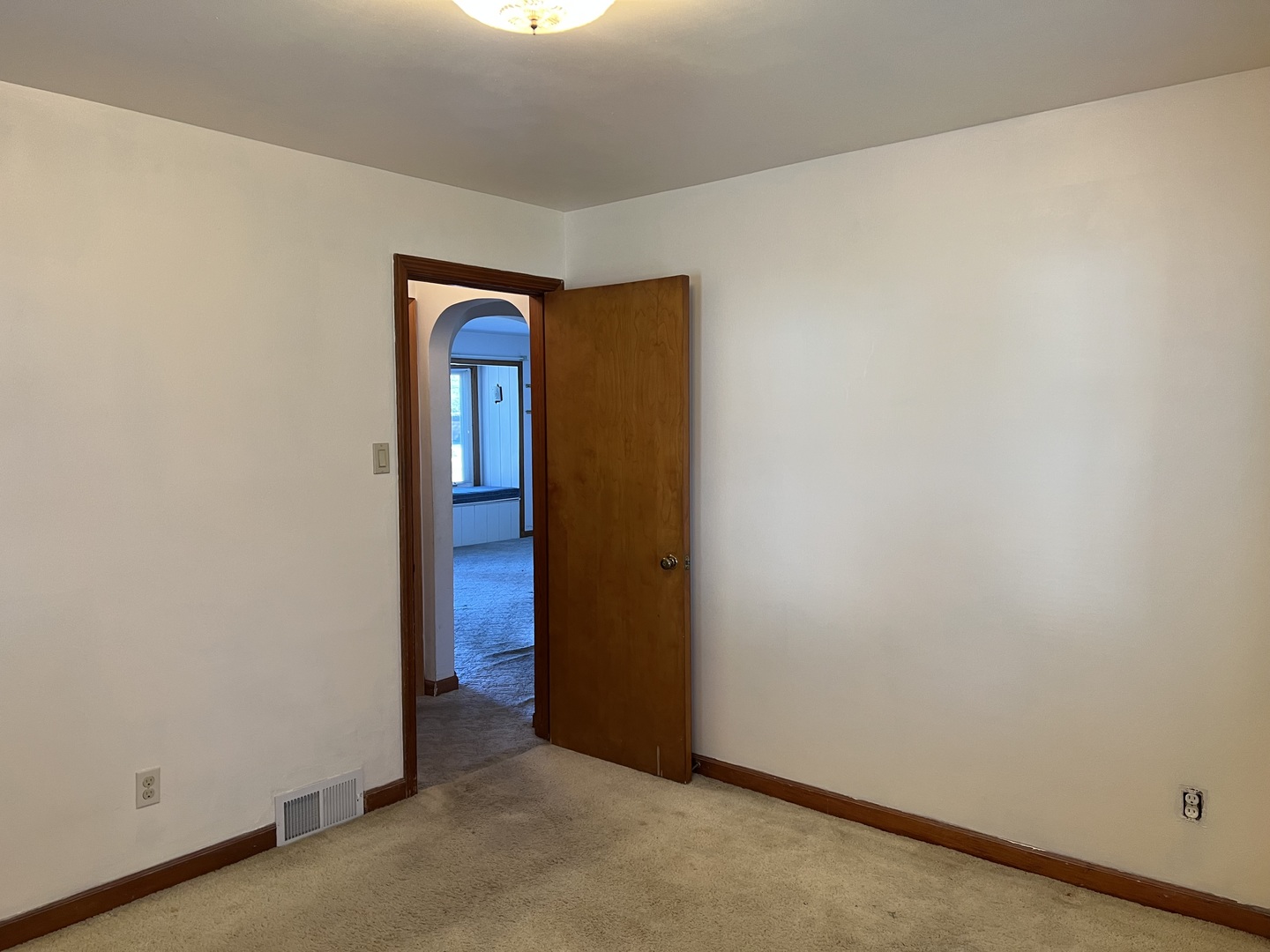 681 South Tanner Avenue Kankakee, IL 60901 - Photo 15 of 33 a view of an empty room with wooden wall