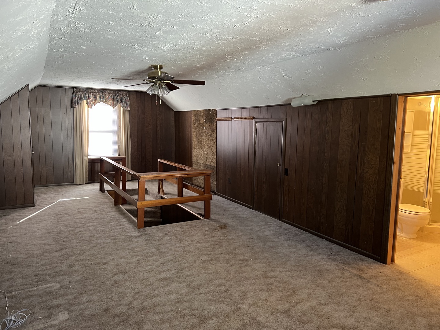 681 South Tanner Avenue Kankakee, IL 60901 - Photo 28 of 33 an empty room with windows and ceiling fan
