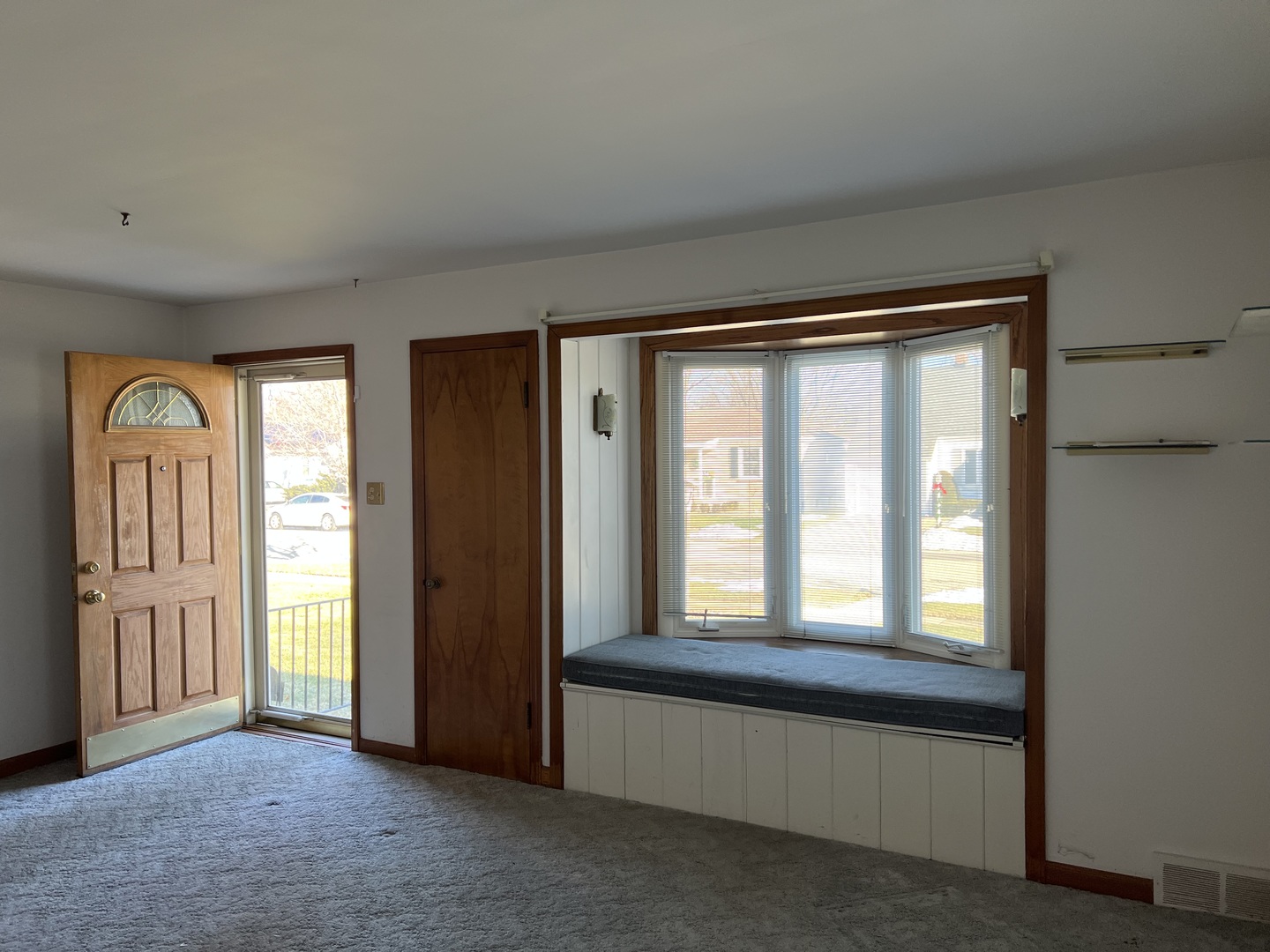 681 South Tanner Avenue Kankakee, IL 60901 - Photo 4 of 33 a view of an empty room with a window