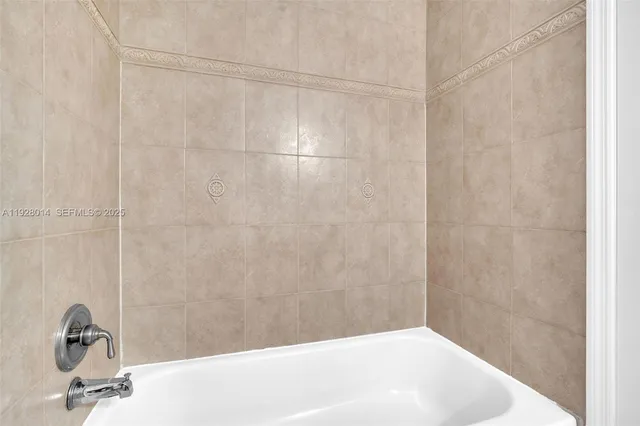 a bathroom with a bathtub