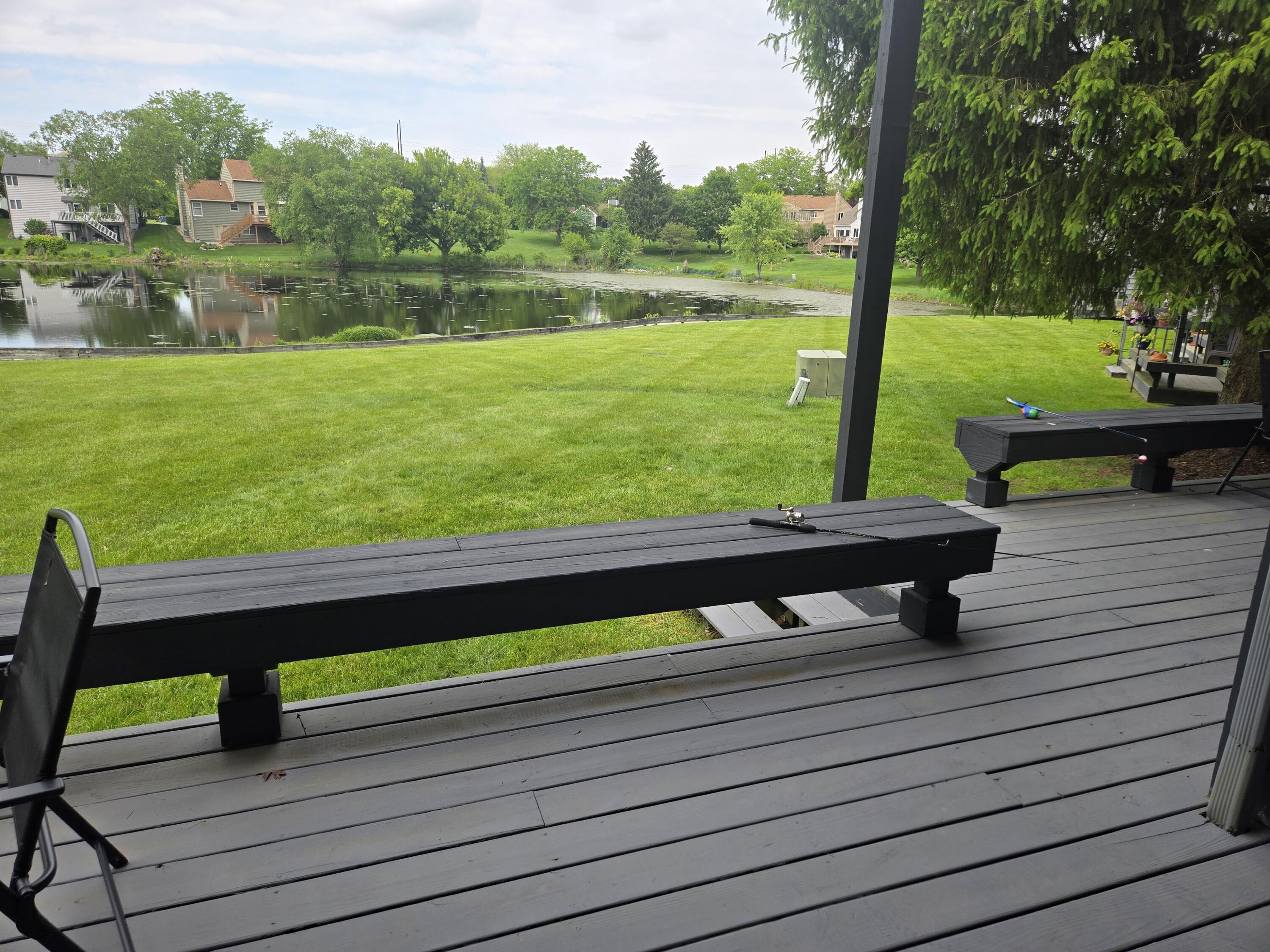 1300 Winding Ridge Lane, Unit C8 Valparaiso, IN 46383 - Photo 12 of 13 a view of a wooden bench sitting on a deck