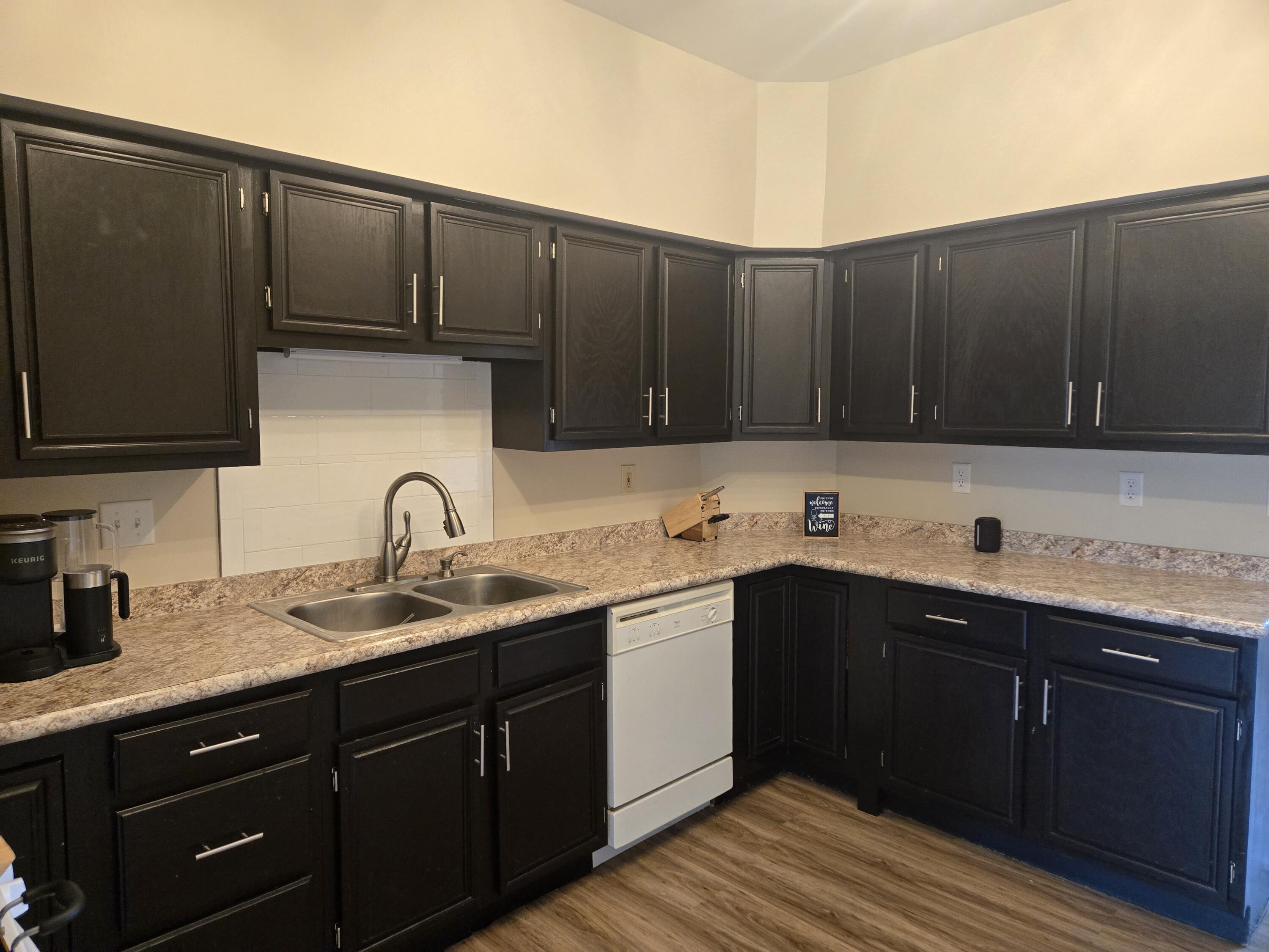 1300 Winding Ridge Lane, Unit C8 Valparaiso, IN 46383 - Photo 6 of 13 a kitchen with a sink and cabinets