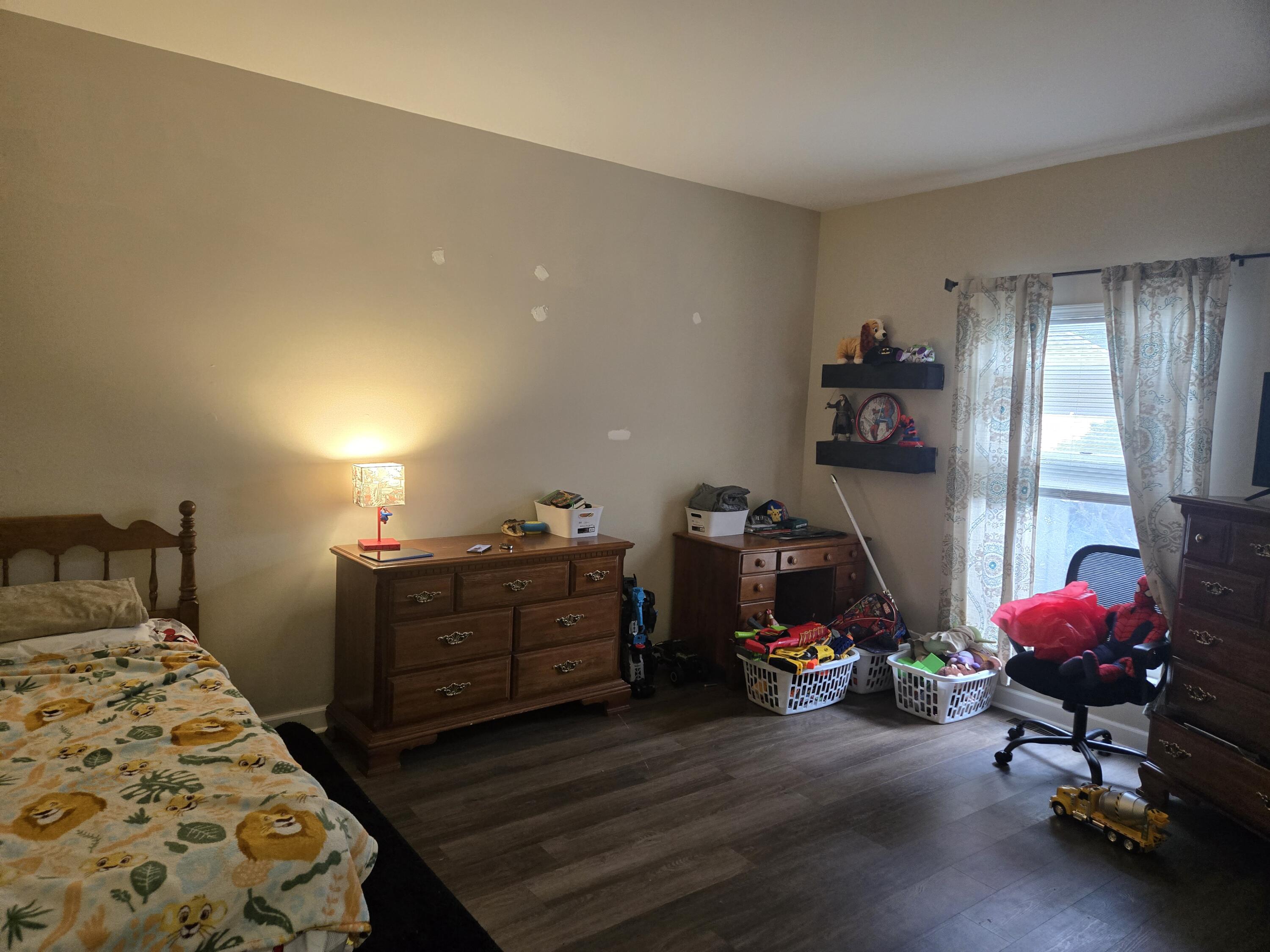 1300 Winding Ridge Lane, Unit C8 Valparaiso, IN 46383 - Photo 8 of 13 a bedroom with bed and a window