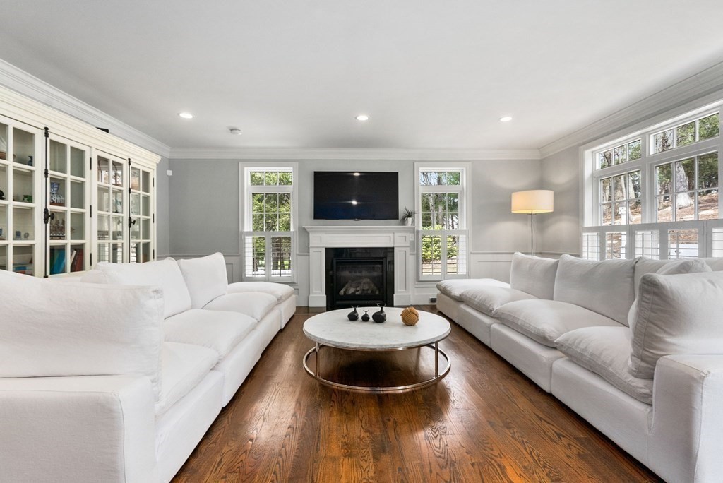 25 Byron Road Weston, MA 02493 - Photo 11 of 21 a living room with furniture and a fireplace