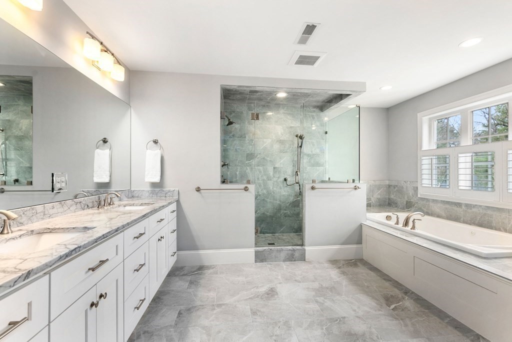 25 Byron Road Weston, MA 02493 - Photo 15 of 21 a spacious bathroom with a double vanity sink a mirror and a bathtub