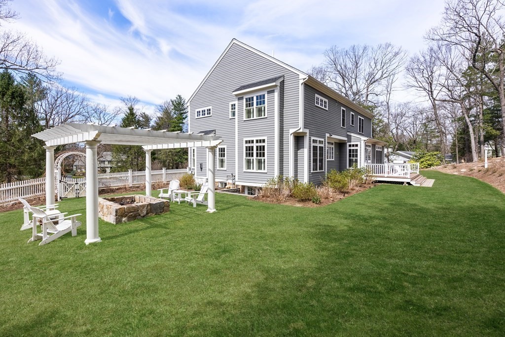 25 Byron Road Weston, MA 02493 - Photo 20 of 21 a front view of house with yard