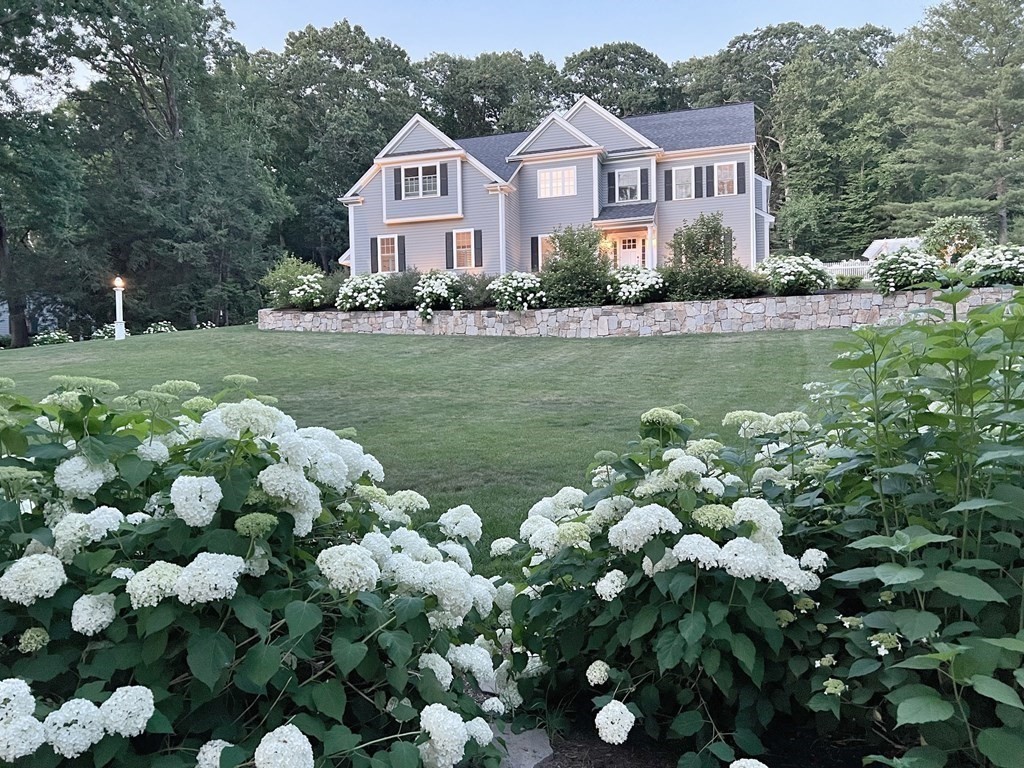 25 Byron Road Weston, MA 02493 - Photo 2 of 21 a front view of a house with garden