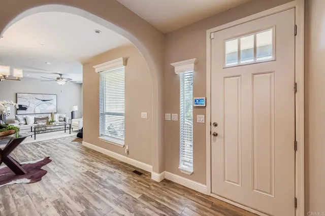 a view of a living room and dining room