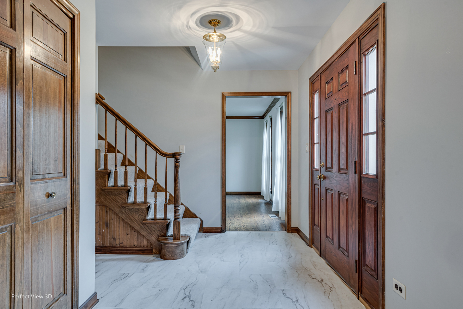 1243 Redfield Road Naperville, IL 60563 - Photo 2 of 45 a view of an entryway with a livingroom