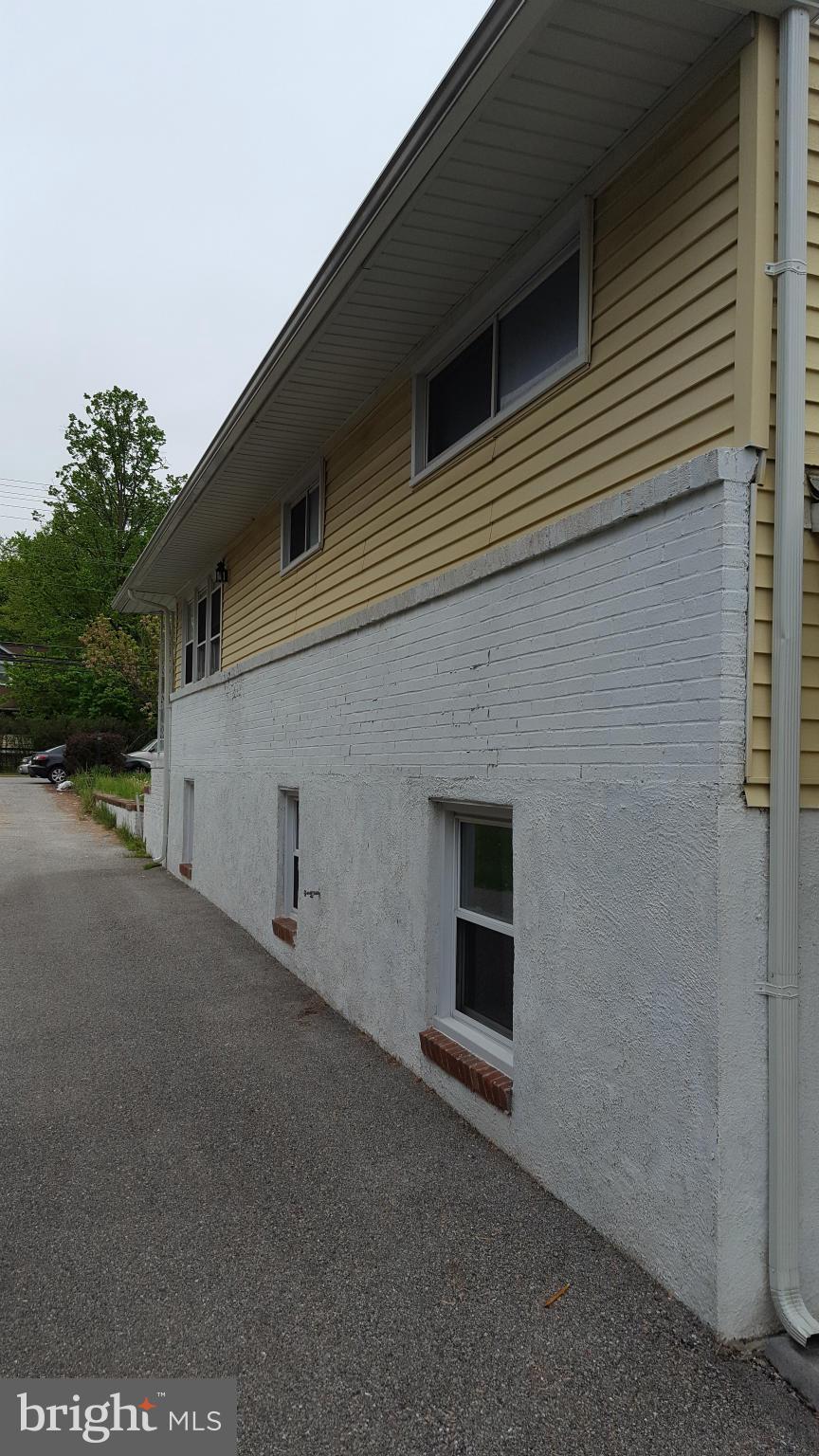 8320 Liberty Road Baltimore, MD 21244 - Photo 2 of 13 a view of a house with backyard space