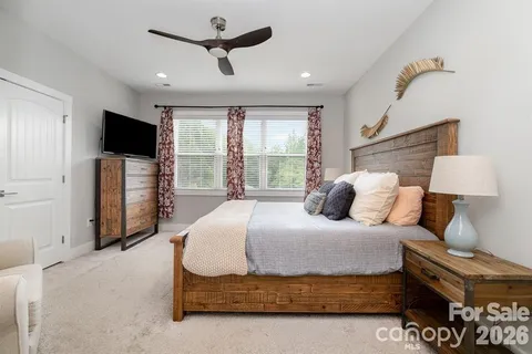 a bathroom with a sink double vanity and a mirror