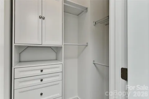 a view of bathroom with wooden floor