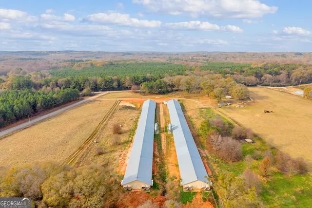 a view of swimming pool with a lake