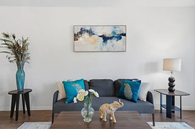 a kitchen with a sink a counter space and a window