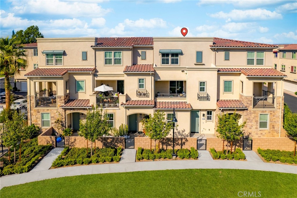 1533 St Simon Circle, Unit B Alhambra, CA 91803 - Photo 1 of 27 a front view of a house with a yard