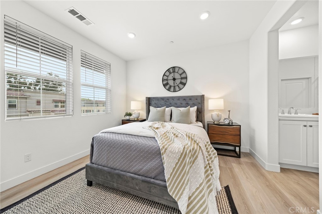 1533 St Simon Circle, Unit B Alhambra, CA 91803 - Photo 11 of 27 a bedroom with a bed and a window