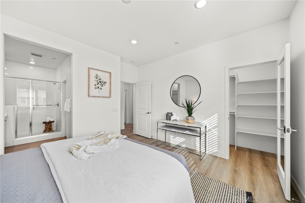 1533 St Simon Circle, Unit B Alhambra, CA 91803 - Photo 12 of 27 a bedroom with a bed and a dresser