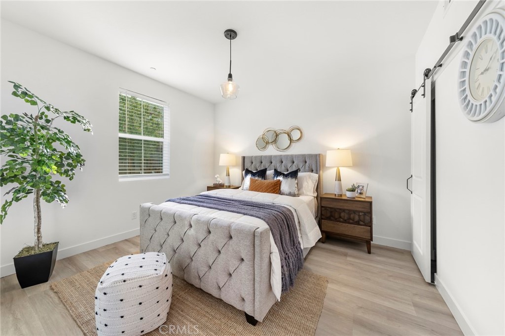 1533 St Simon Circle, Unit B Alhambra, CA 91803 - Photo 16 of 27 a bedroom with bed and window