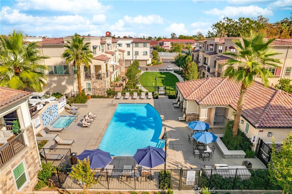 1533 St Simon Circle, Unit B Alhambra, CA 91803 - Photo 23 of 27 a view of multiple houses with yard