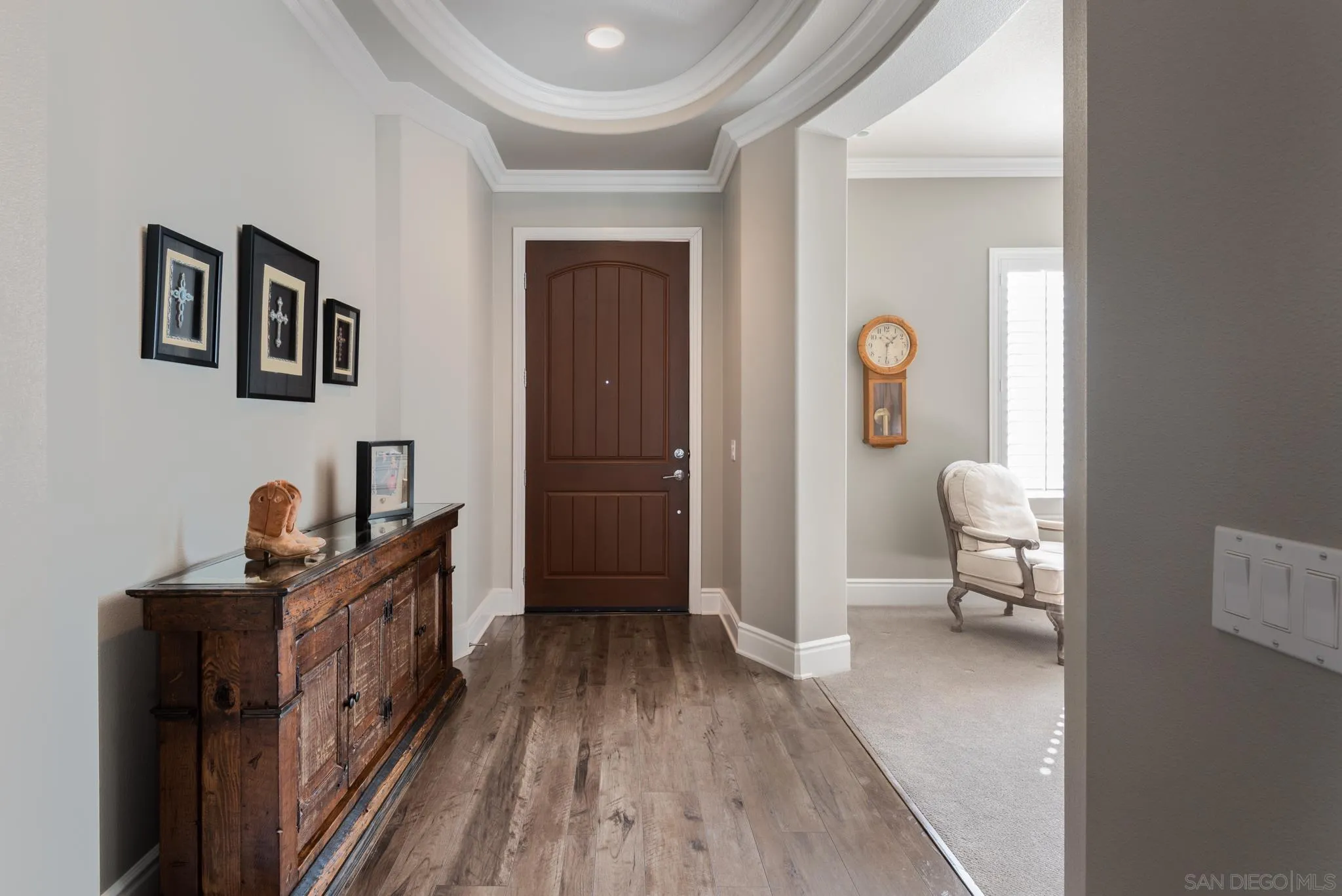 3234 Corte Aliso Carlsbad, CA 92009 - Photo 13 of 44 a living room with furniture and a wooden floor