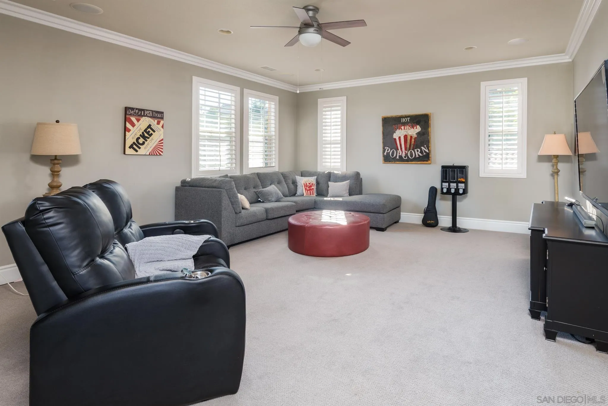 3234 Corte Aliso Carlsbad, CA 92009 - Photo 17 of 44 a living room with furniture a fireplace and a window