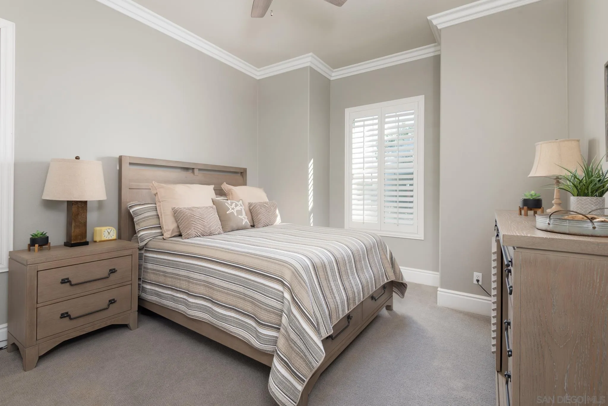 3234 Corte Aliso Carlsbad, CA 92009 - Photo 19 of 44 a bed room with a bed and a night stand