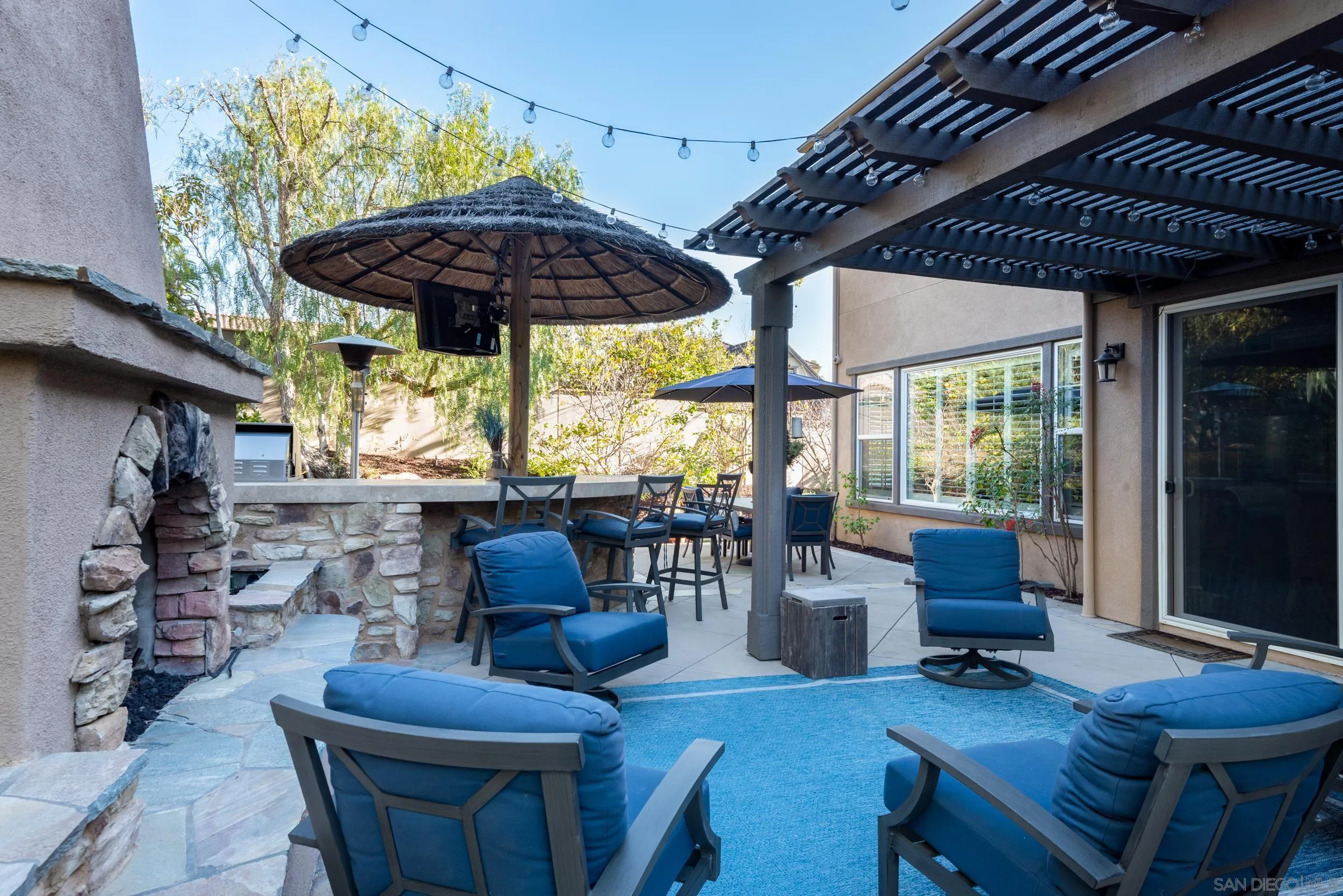 3234 Corte Aliso Carlsbad, CA 92009 - Photo 38 of 44 a view of a dining room with furniture window and outside view