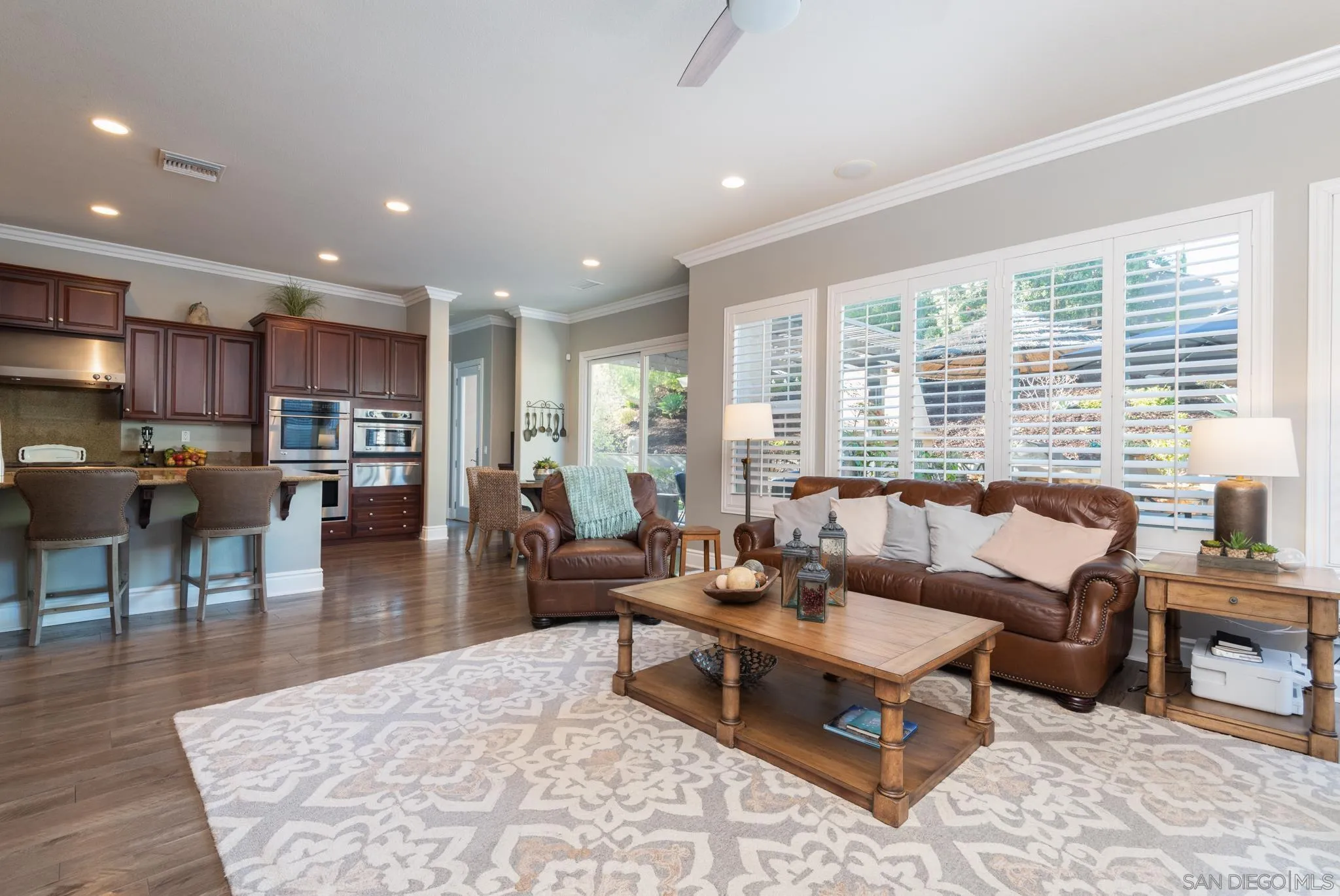 3234 Corte Aliso Carlsbad, CA 92009 - Photo 6 of 44 a living room with furniture and a large window