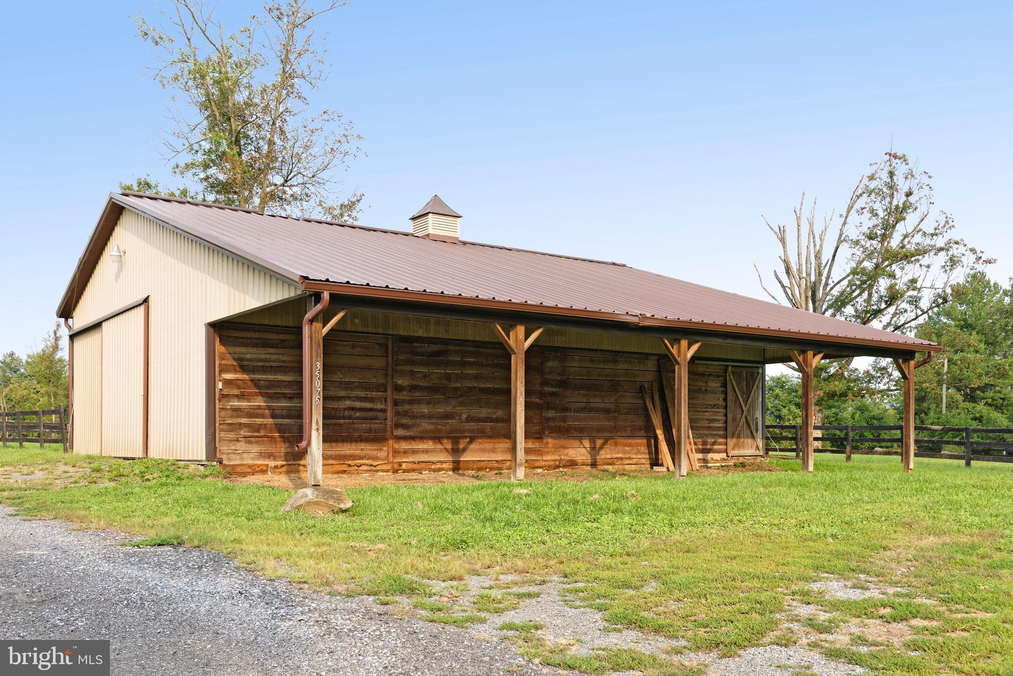 35075 Bloomfield Road Round Hill, VA 20141 - Photo 29 of 63 Barn has extra overhang to store equipment