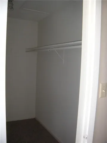 a empty closet with white paint