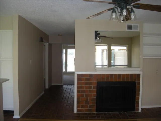 a view of an entryway and livingroom