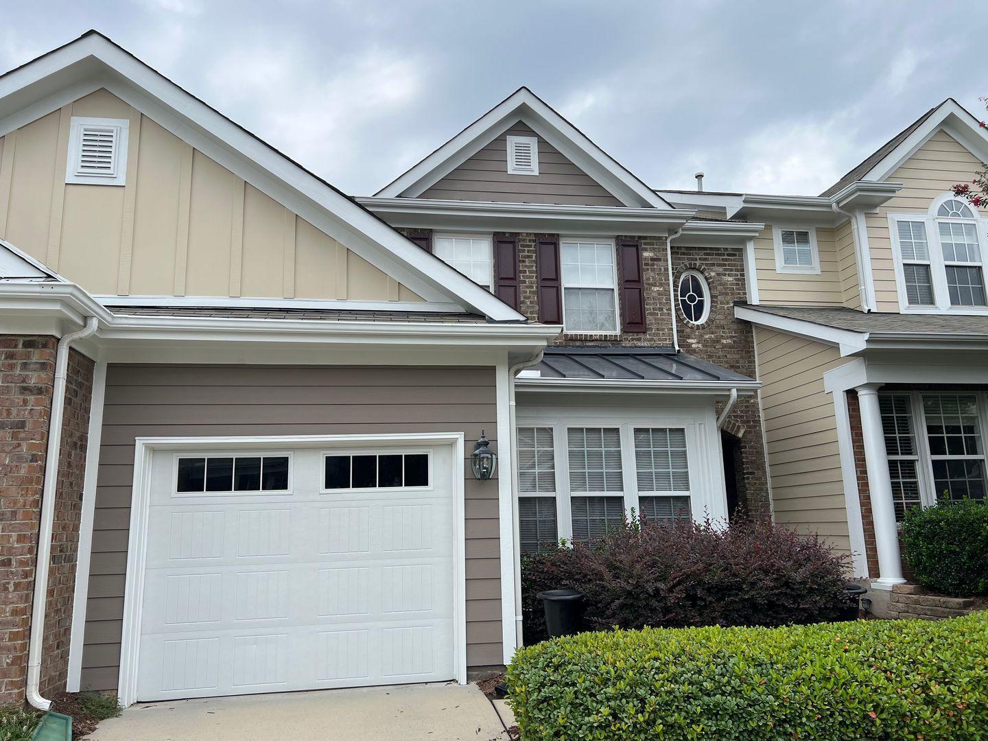10117 Falls Meadow Court Raleigh, NC 27617 - Photo 2 of 34 a front view of a house with a yard