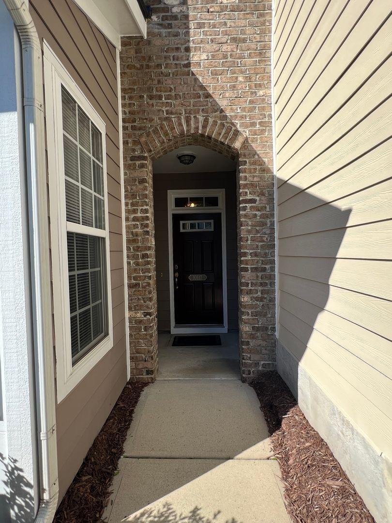 10117 Falls Meadow Court Raleigh, NC 27617 - Photo 4 of 34 a view of front door of house