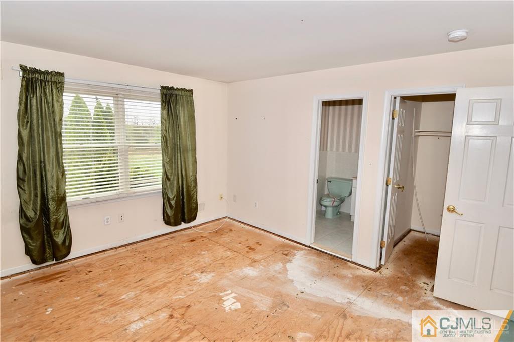267 Summer Road Neshanic Station, NJ 08853 - Photo 24 of 25 a view of an empty room with a window