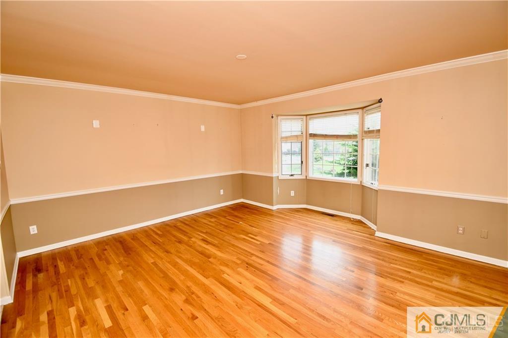 267 Summer Road Neshanic Station, NJ 08853 - Photo 5 of 25 a view of an empty room and window